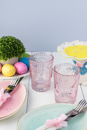 Egg shaped plates, Easter glasses for Easter celebration.