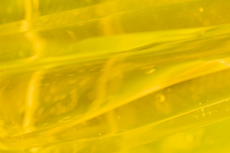 close-up shot of abstract golden glass backgroundの写真素材