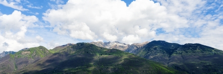 Alps mountains panorama with forest and snow peaks, Switzerlandの写真素材