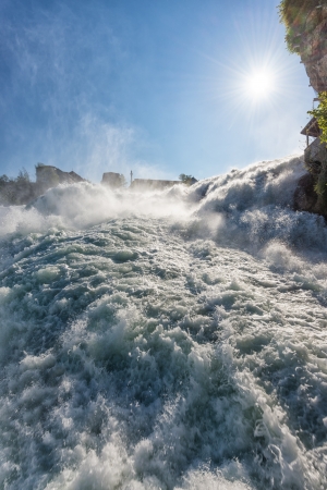 Close up of roaring Rhine Falls in Switzerlandの写真素材