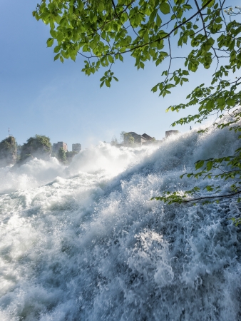 Close up of roaring Rhine Falls in Switzerlandの写真素材