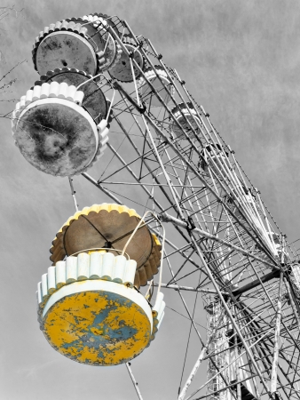 Yellow cabin of the abandoned Ferris wheel, Pervouralsk, Urals, Russiaの写真素材