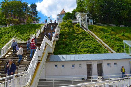 Sellin on Ruegen, Germany - August 18, 2016: View from the bottom up to the staircase with tourists, that connects the town of Sellin with the historic and low-lying pierのeditorial素材