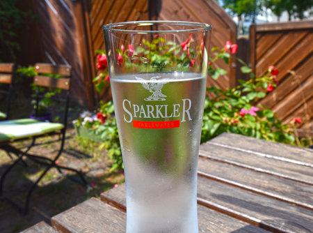Berlin, Germany - June 17, 2018: A large glass of cold table water for refreshment, which is misted from the outside because the high temperatureのeditorial素材