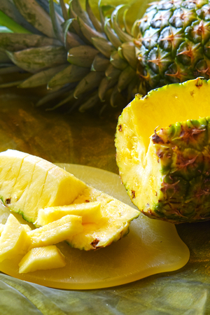 Macro shot of a ripe and sliced pineapple fruit (Ananas comosus).の写真素材