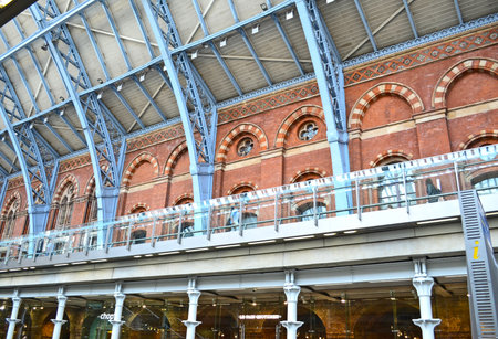 London, Great Britain - August 2, 2015: Historical facade and structural steelwork in Kings Cross St Pancrasのeditorial素材