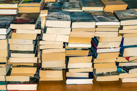 Berlin, Germany - October 22, 2018: Many used and stacked German books that were sorted out after reading.のeditorial素材