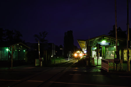 Berlin, Germany - July 12, 2018: Night scene of an old Berlin S-Bahn station in the district of Lichtenradeのeditorial素材
