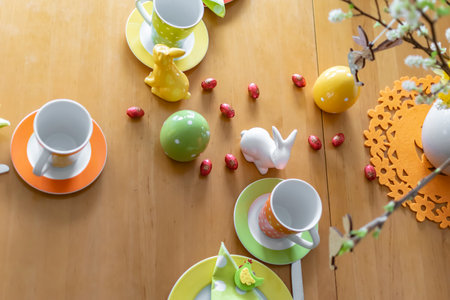 Berlin, Germany - April 1, 2018: View to a View to a colorful easygoing family breakfast table decorated for Easter.のeditorial素材