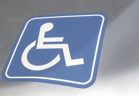 Close-up of a sign on a car for handicapped people in Germany.の写真素材