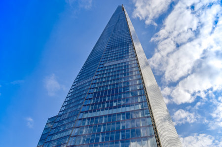 London, Great Britain - August 1, 2015: View from below to the skyscraper Shard in the center of London.のeditorial素材