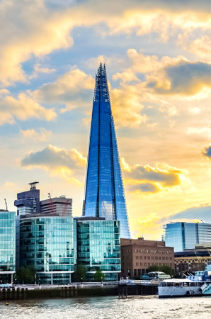 London, Great Britain - August 1, 2015: View over the river thames to the skyscraper Shard in the center of London at dusk.のeditorial素材