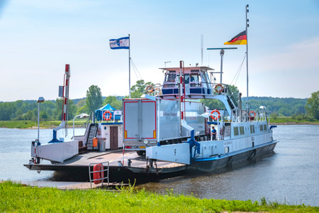 Neu Darchau, Germany - May 20, 2019: Truck crossing the river Elbe on a ferry at Neu Darchau, Germany.のeditorial素材