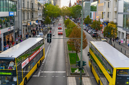 Berlin, Germany - October 5, 2019: Scene in a shopping street in Berlin-Steglitz with passersby, cars and busses.のeditorial素材
