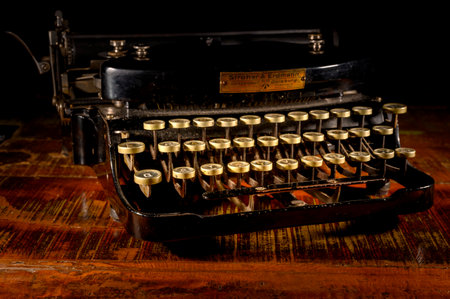 Berlin, Germany - October 16, 2019: Detail of a historic dusty portable typewriter made in Germany during the twenties of the 20th century.のeditorial素材