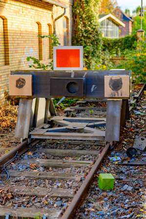 Berlin, Germany - October 26, 2019: View to the end of a track of a Berlin S-Bahn line with bumper and railway buildings.のeditorial素材