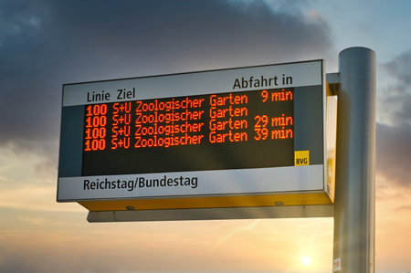 Berlin, Germany - June 17, 2019: Close-up of an electronic sign of a bus stop in public transport in Berlin, Germany. The stop is at the German parliament and the Berlin Zoo is the destination.のeditorial素材