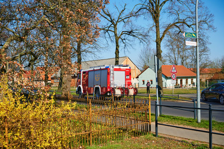 Grossziethen, Germany - April 6, 2020: Fire engine of the volunteer fire brigade on the way to a...