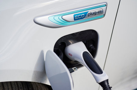 Berlin, Germany - March 14, 2020: View to the charger of an eco friendly electric plug-in car.