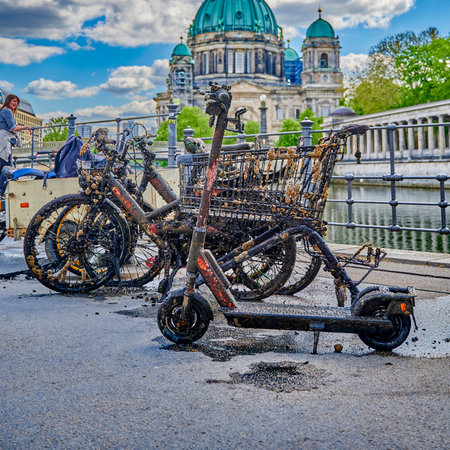 Berlin, Germany - April 26, 2020: Bicycles and other objects completely covered with mud, algae and barnacles were recovered by committed citizens from the Spree river in central Berlin.のeditorial素材
