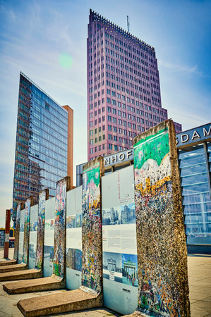 Berlin, Germany - May 8, 2020: The historic Potsdamer Platz in Berlin with parts of the Berlin Wall in the foreground and the modern high-rise buildings in the background.のeditorial素材