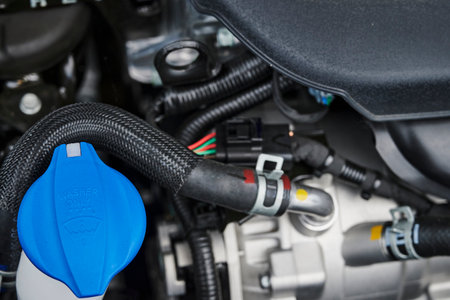 Berlin, Germany - June 24, 2020: A look into the engine compartment of a plug-in hybrid car with various components.のeditorial素材