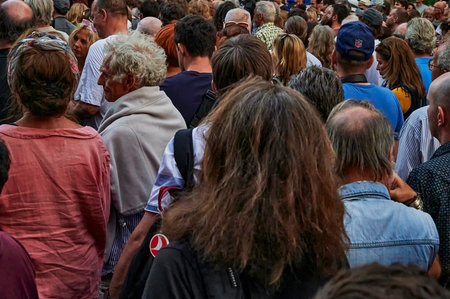 Berlin, Germany - June 28, 2019: Large crowd without sufficient social distancing.