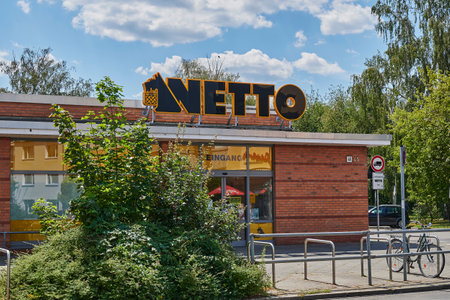 Berlin, Germany - July 14, 2020: Facade of a supermarket in a small shopping street in Berlin, Germany.のeditorial素材