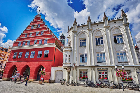 Greifswald, Germany - August 31, 2020: Cityscape of the historic market square of the Hanseatic city of Greifswald in Germany.のeditorial素材
