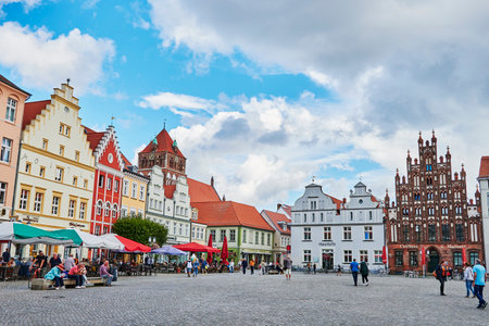 Greifswald, Germany - August 31, 2020: Cityscape of the historic market square of the Hanseatic city of Greifswald in Germany.のeditorial素材