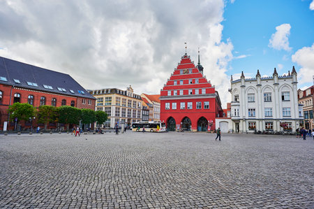 Greifswald, Germany - August 31, 2020: Cityscape of the historic market square of the Hanseatic city of Greifswald in Germany.のeditorial素材