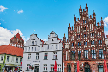 Greifswald, Germany - August 31, 2020: Cityscape of the historic market square of the Hanseatic city of Greifswald in Germany.のeditorial素材