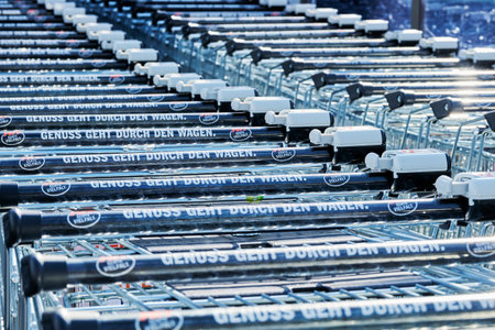 Berlin, Germany - October 3, 2020: View to a row of shopping carts in front of a shop.のeditorial素材