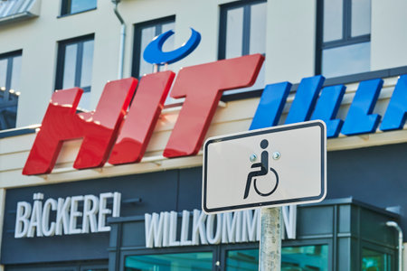 Berlin, Germany - October 3, 2020: Sign for handicapped parking in front of a supermarket in a suburb of Berlin, Germany.のeditorial素材