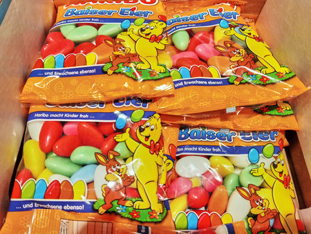 Berlin, Germany - March 18, 2021: View to different packages of Easter sweets in a supermarket.のeditorial素材