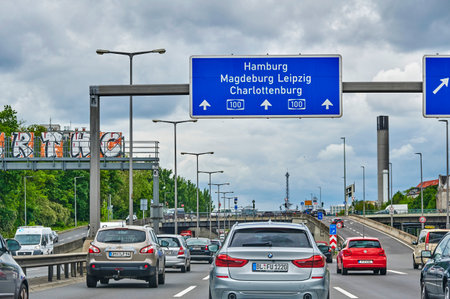 Berlin, Germany - May 27, 2021: Scene on the Berlin A100 freeway with various vehicles at the start of rush hour traffic.のeditorial素材