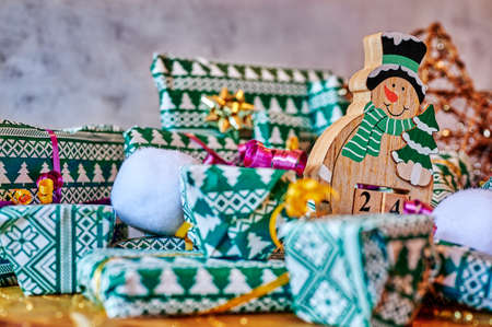 Wrapped gifts that are part of an advent calendar and Christmas decorations.の写真素材