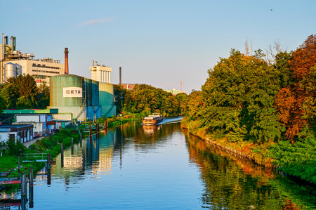 Berlin, Germany - September 10, 2021: Cargo shipping on the Teltow Canal in Berlin at dawn.のeditorial素材