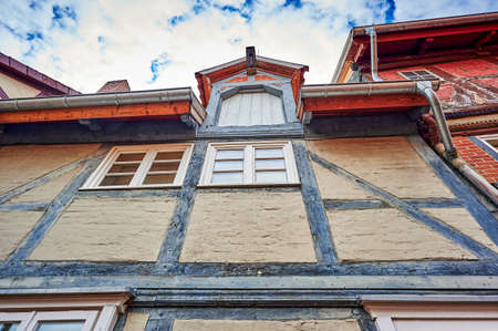 View to the German medieval town Dannenberg. You can see the facade of a historic house with half-timbered architecture.の写真素材