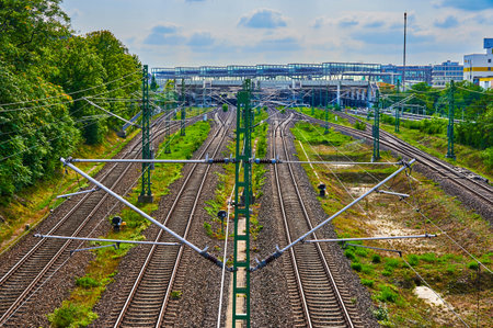 Berlin, Germany - September 5, 2021: View to railway tracks of the Deutsche Bahn with catenaries, which belong to the main connection from north to south through Berlin.のeditorial素材