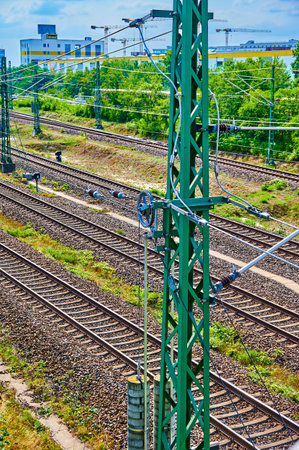 Berlin, Germany - September 5, 2021: View to railway tracks of the Deutsche Bahn with catenaries, which belong to the main connection from north to south through Berlin.のeditorial素材
