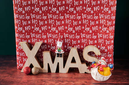 Atmospheric photo of a packed Christmas present with decoration.の写真素材