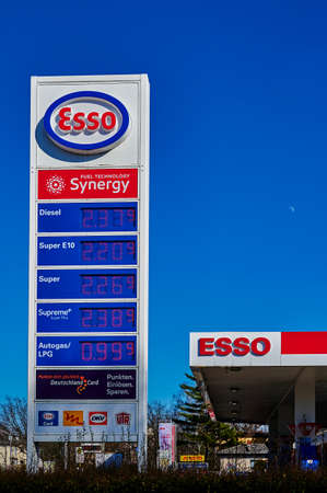 Berlin, Germany - March 11, 2022: View to the price board of an Esso Group gas station with extremely high prices.のeditorial素材