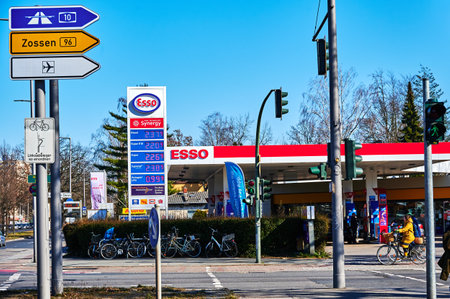 Berlin, Germany - March 11, 2022: View to the price board of an Esso Group gas station with extremely high prices.のeditorial素材