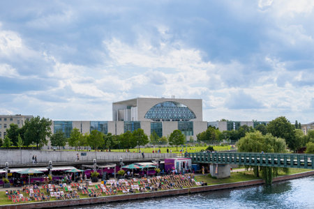 Berlin, Germany - July 29, 2021: View to a promenade of the river Spree in the government district of Berlin, Germany.のeditorial素材