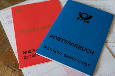Berlin, Germany - July 25, 2022: View to old savings books from various banks.
