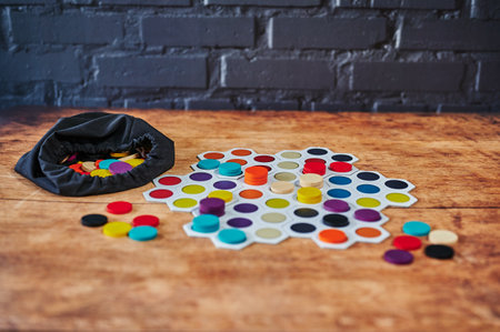 Berlin, Germany - February 10, 2022: Board game with playing fields and wooden tiles for stacking.のeditorial素材
