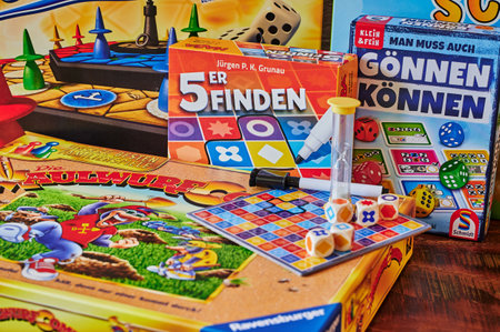 Berlin, Germany - September 12, 2022: Board games with gaming accessories.