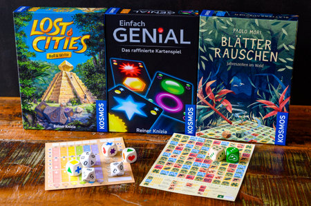 Berlin, Germany - March 13, 2023: Different board games with gaming accessories.のeditorial素材