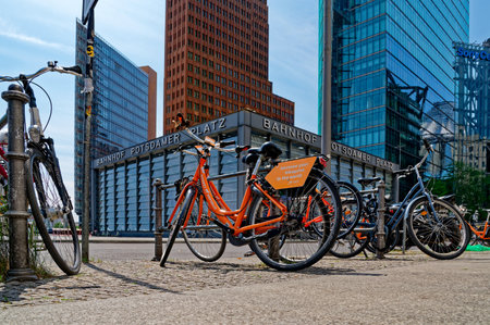 Berlin, Germany - May 8, 2020: Train station and skyscrapers at Potsdamer Platz in Berlin, Germany, with rental bikes in the foreground.のeditorial素材